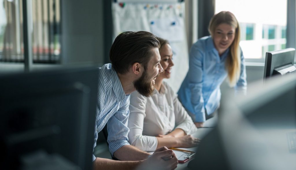 a group of people sitting at a table