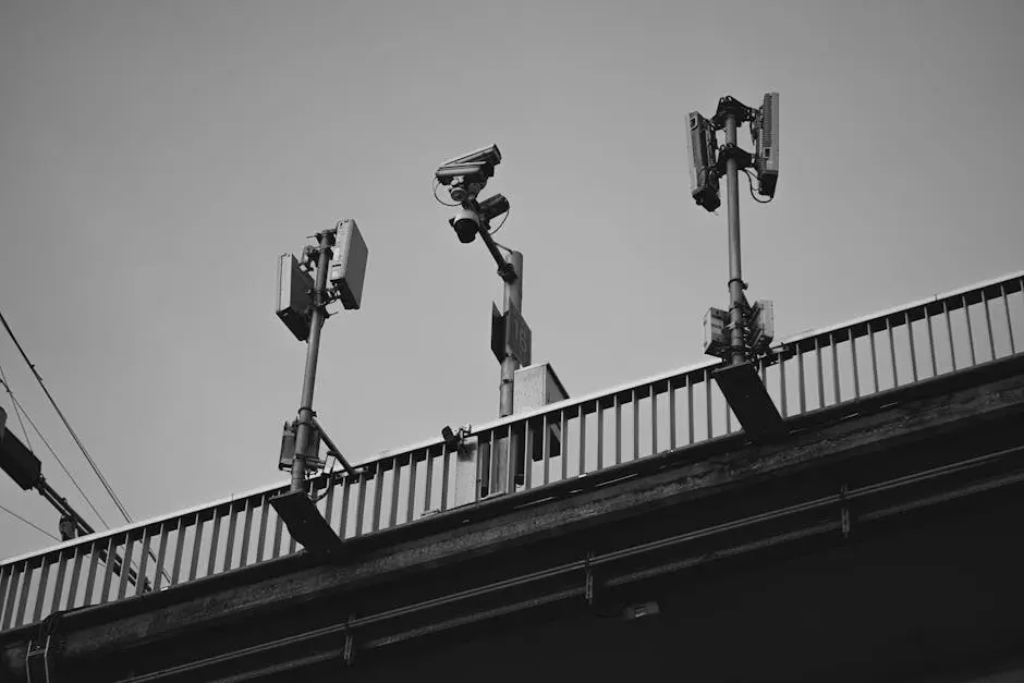 a group of cameras on a bridge
