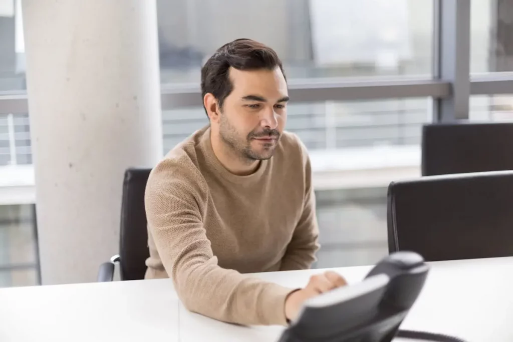 a man sitting at a desk